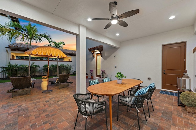 dining room featuring ceiling fan