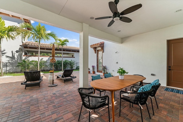 view of patio with ceiling fan