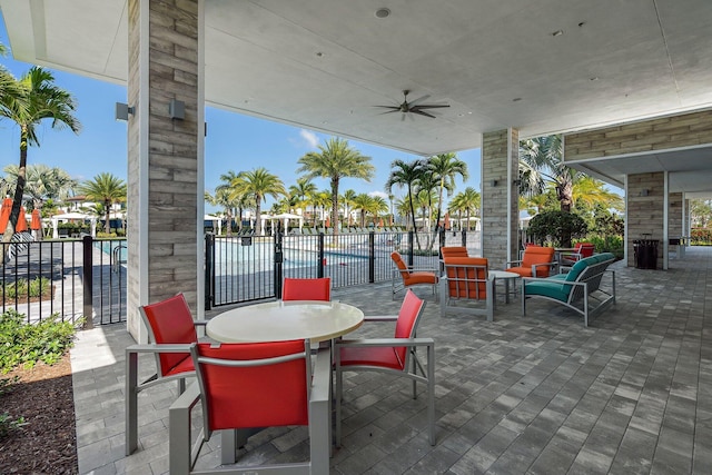 view of patio featuring ceiling fan