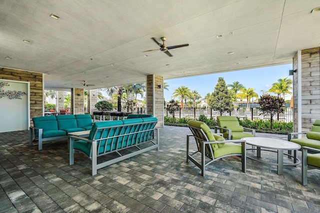 view of patio featuring outdoor lounge area and ceiling fan