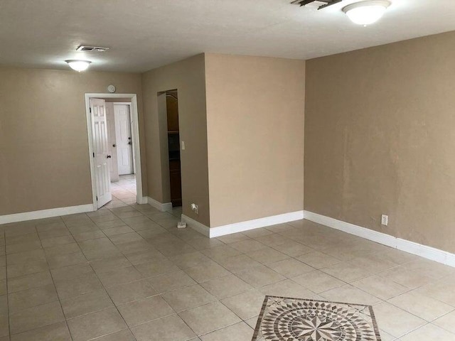 view of tiled spare room