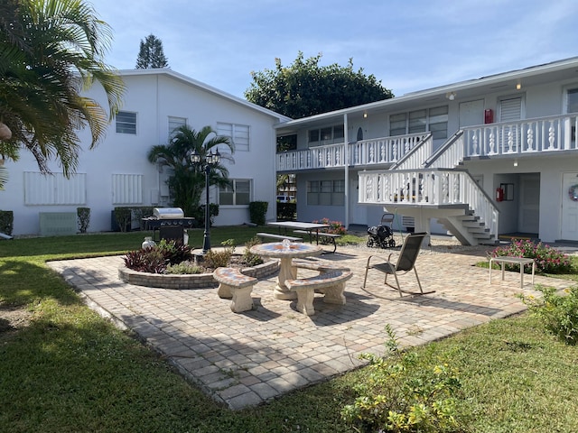 95 Cambridge E Unit 95, West Palm Beach, FL 33417 - view of patio / terrace featuring stairway