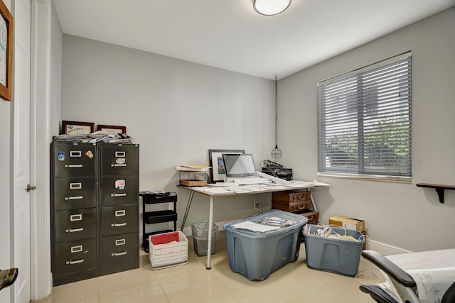 home office with light tile patterned flooring