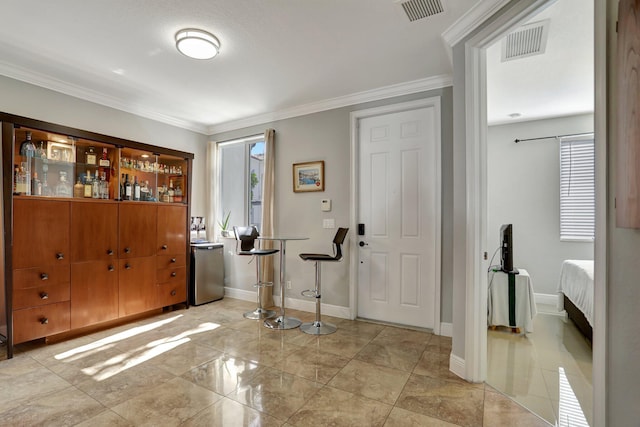 bathroom featuring tile patterned floors, vanity, a shower with shower door, and toilet