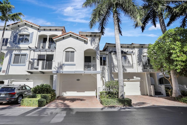 view of front of property with a garage