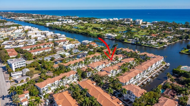 birds eye view of property featuring a water view