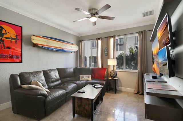 tiled living room with crown molding and ceiling fan