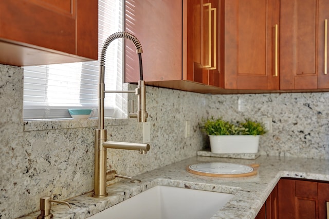 room details with tasteful backsplash and light stone counters