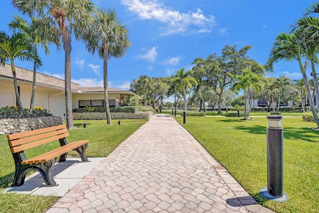 surrounding community featuring a yard