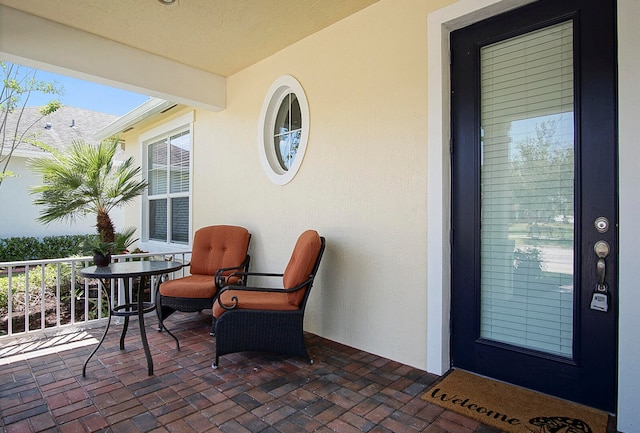 view of patio with a balcony