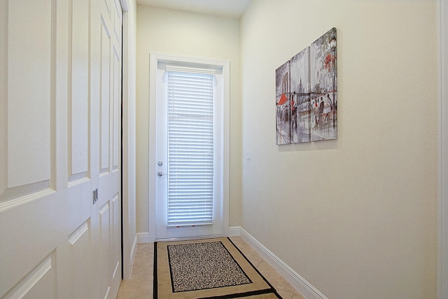 doorway featuring light tile patterned floors