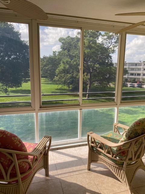 sunroom featuring a healthy amount of sunlight