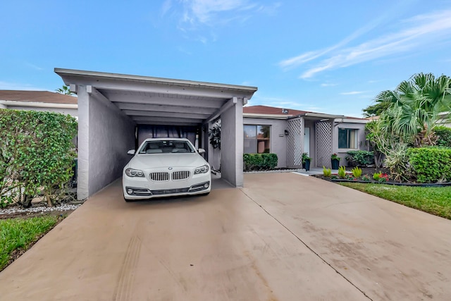 view of front of property featuring a carport