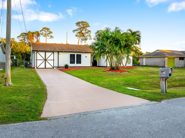 single story home with a front yard