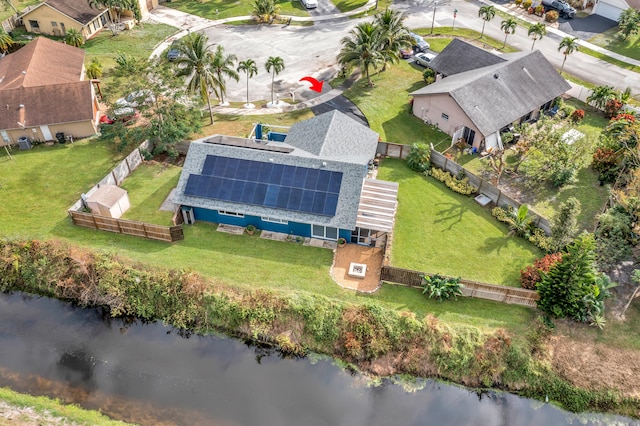 drone / aerial view with a water view