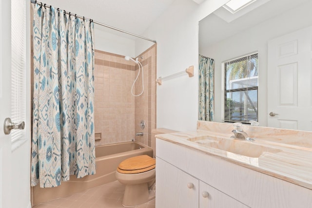 full bathroom with tile patterned floors, vanity, toilet, and shower / tub combo with curtain