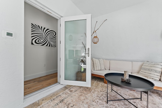 sitting room with hardwood / wood-style floors