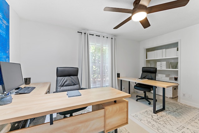 office space featuring ceiling fan