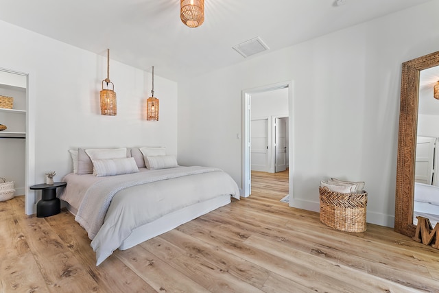 bedroom featuring light wood-type flooring