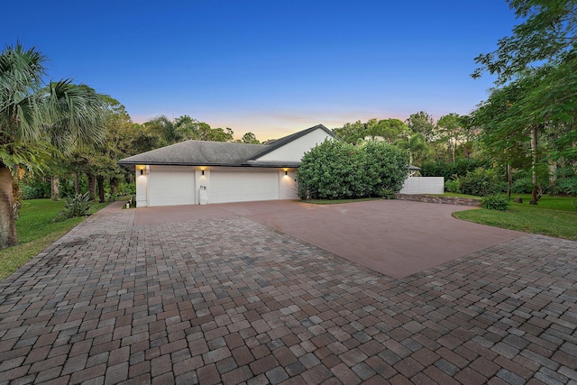 view of front of home with a garage