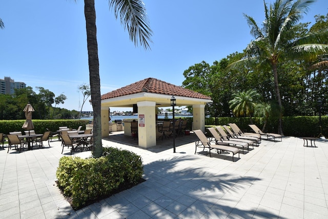 view of community with a gazebo and a patio area