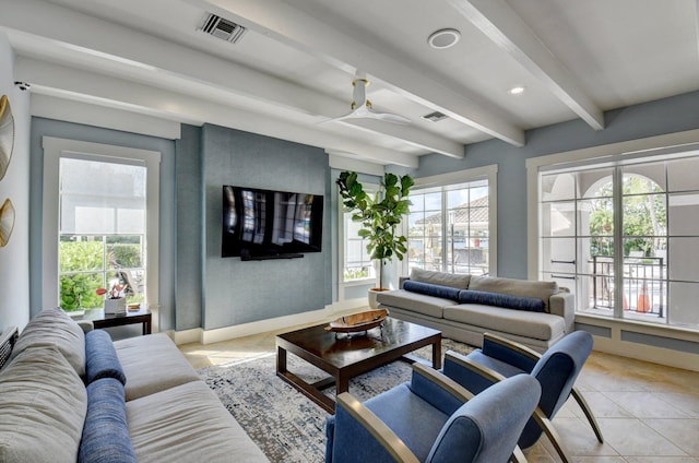 tiled living room featuring beam ceiling and ceiling fan