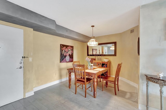 dining area featuring hardwood / wood-style floors