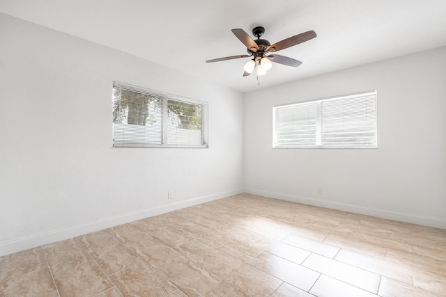 empty room featuring ceiling fan