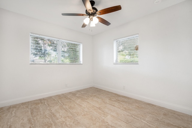 empty room featuring ceiling fan