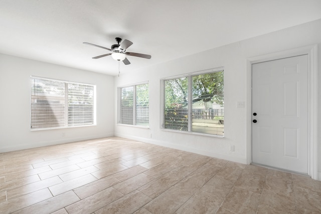 spare room featuring ceiling fan