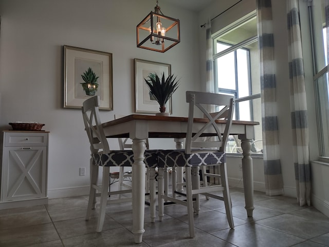 dining area featuring a chandelier