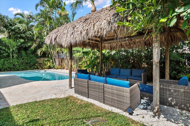 view of swimming pool featuring a gazebo, outdoor lounge area, and a patio