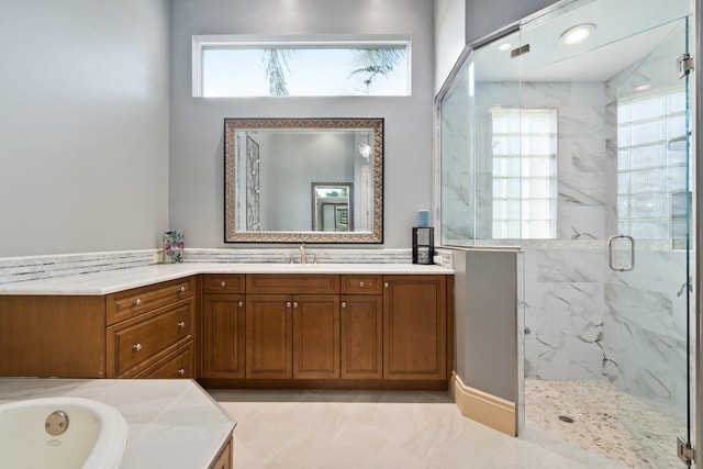 bathroom with tile patterned flooring, vanity, and plus walk in shower