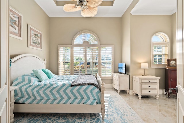 bedroom featuring ceiling fan and crown molding