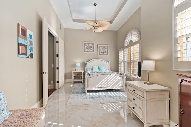 bedroom with ceiling fan and ornamental molding