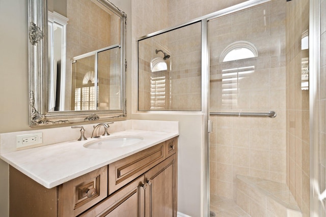 bathroom with vanity and walk in shower