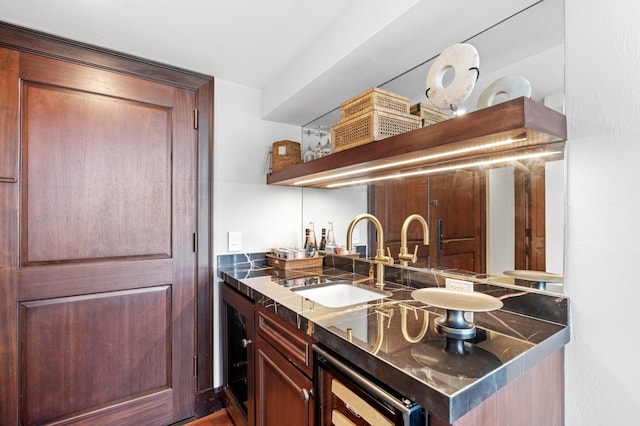 kitchen with sink and beverage cooler