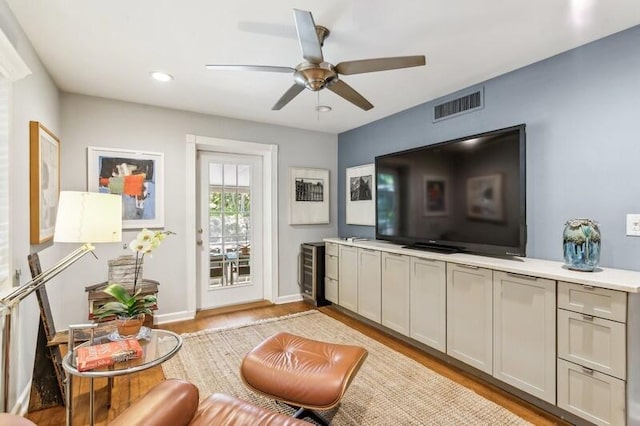 interior space featuring ceiling fan and light wood-type flooring