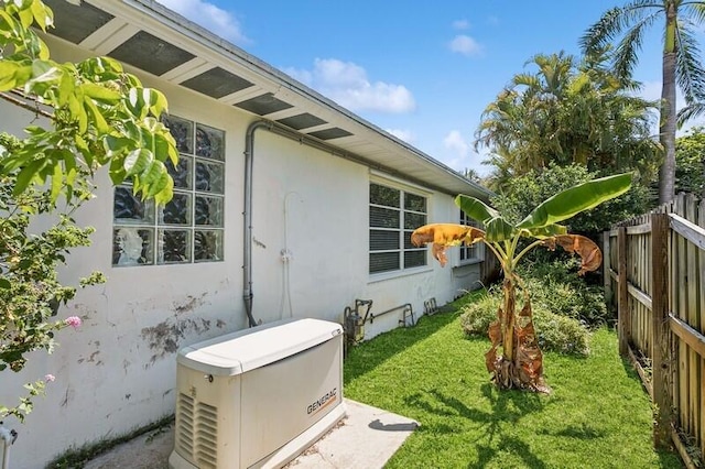 view of property exterior with a lawn