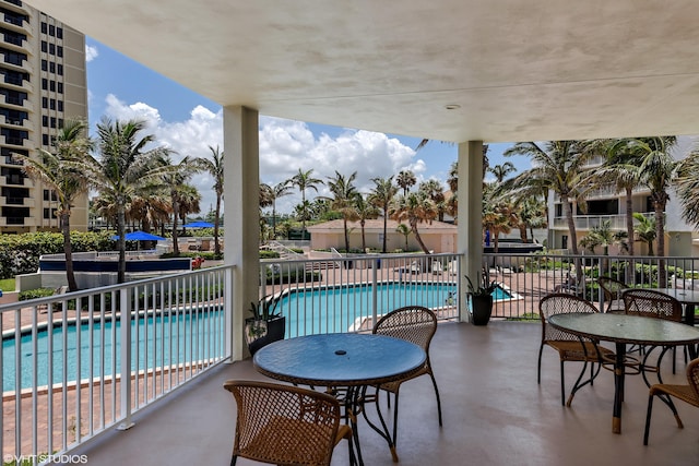 view of pool featuring a patio