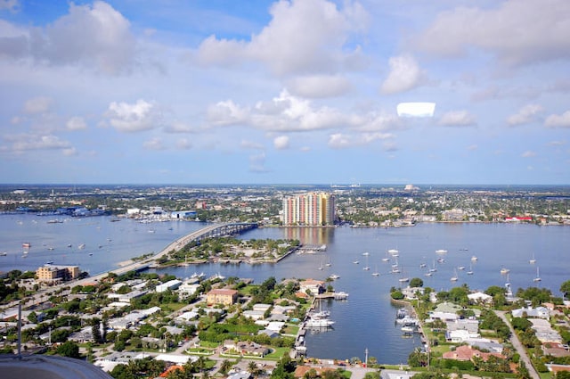 birds eye view of property featuring a water view