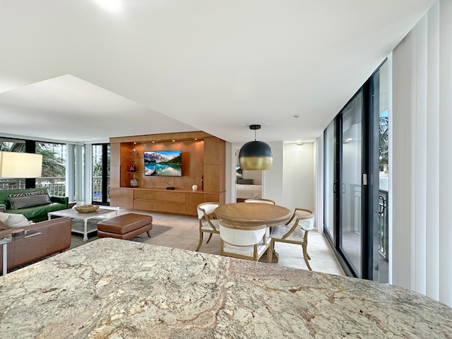 living room with floor to ceiling windows