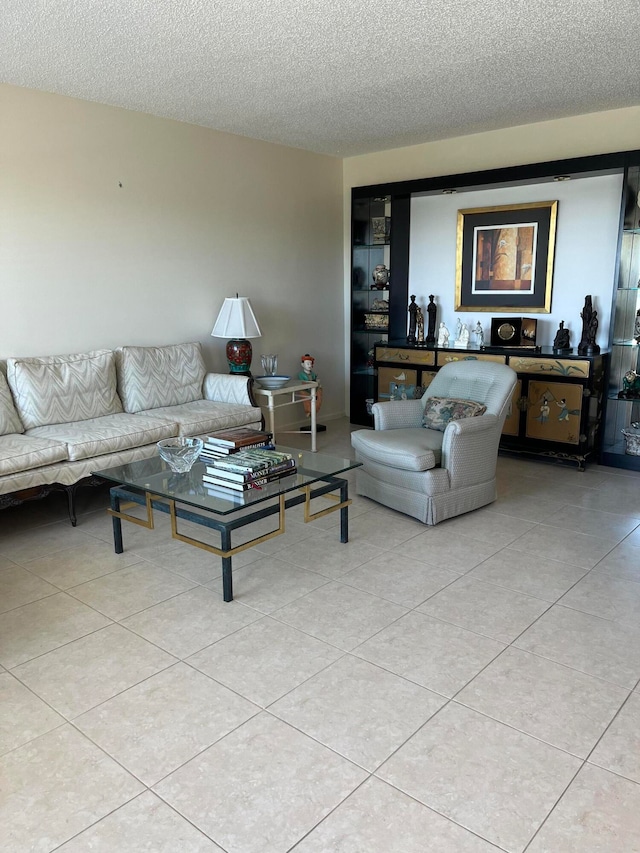 tiled living room with a textured ceiling