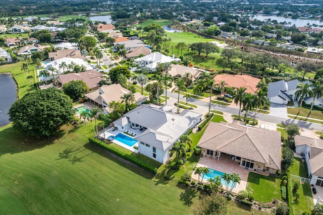 bird's eye view with a water view