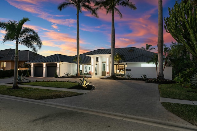 view of front of home with a garage