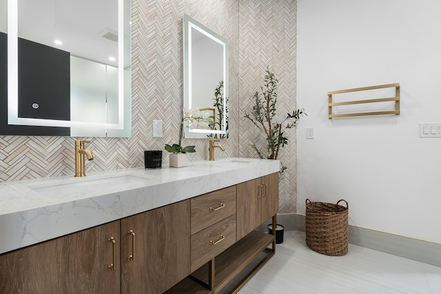 bathroom featuring backsplash, tile patterned flooring, and vanity