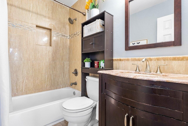 full bathroom featuring vanity, toilet, and shower / bathtub combination with curtain