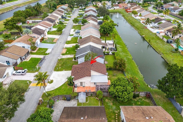 bird's eye view with a water view