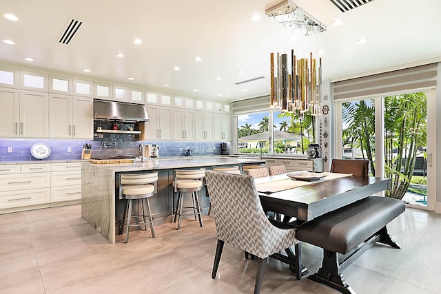 dining room featuring light tile patterned floors