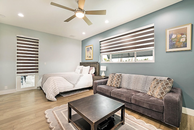 bedroom featuring light hardwood / wood-style floors and ceiling fan